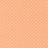 Patterned fabric with small diamond shapes on a peach background