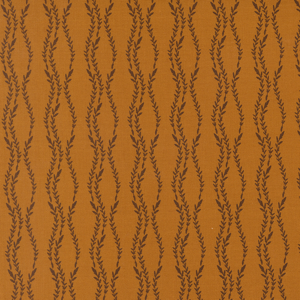 Brown fabric with black leaf-like pattern