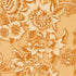 A close-up of a floral patterned fabric featuring large cream and tan flowers with textured brown detailing on a warm beige background.