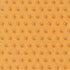A repeating geometric pattern featuring orange-brown diamond and triangle motifs with white dotted details on a warm mustard-yellow background.