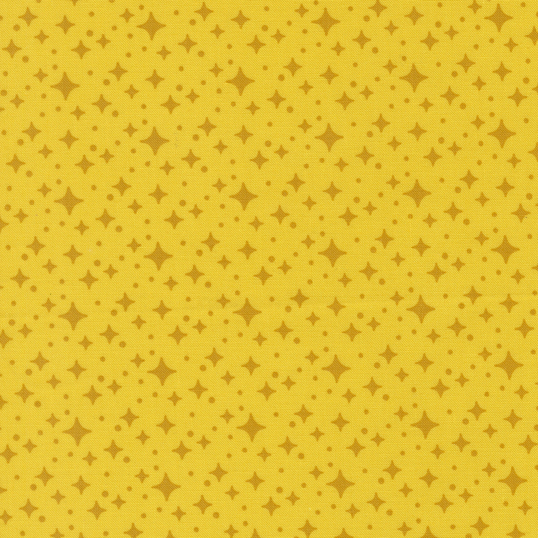 Yellow patterned fabric with star shapes