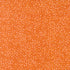 Textured orange fabric pattern with small white dots