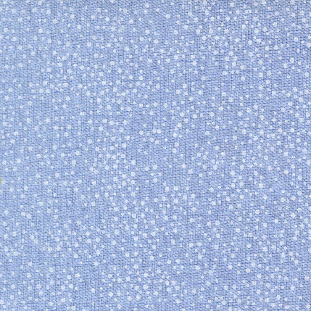 Blue fabric with white polka dot pattern
