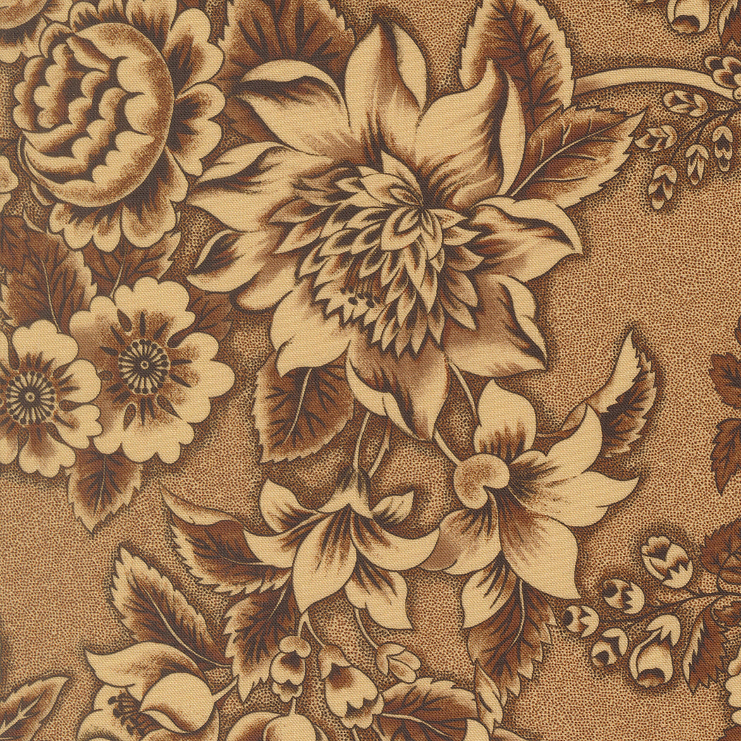 A close-up of a floral patterned fabric or wallpaper featuring large cream-colored flowers and leaves with dark brown shading on a textured tan background.