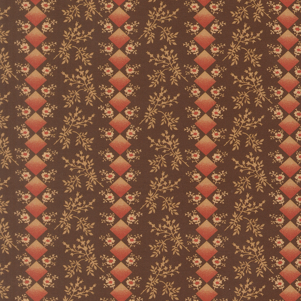 A close-up of a repeating fabric or wallpaper pattern featuring vertical columns of terracotta-colored diamond medallions and beige floral vines on a dark brown background.