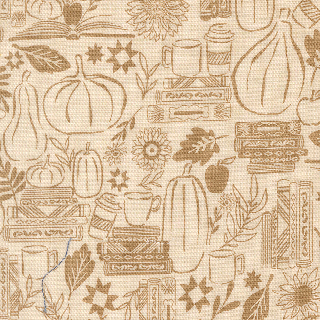 Patterned fabric with pumpkins, books, and other autumnal elements on a beige background