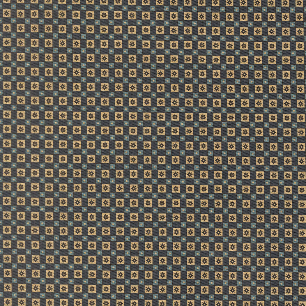 Patterned fabric with small geometric design on a blue background