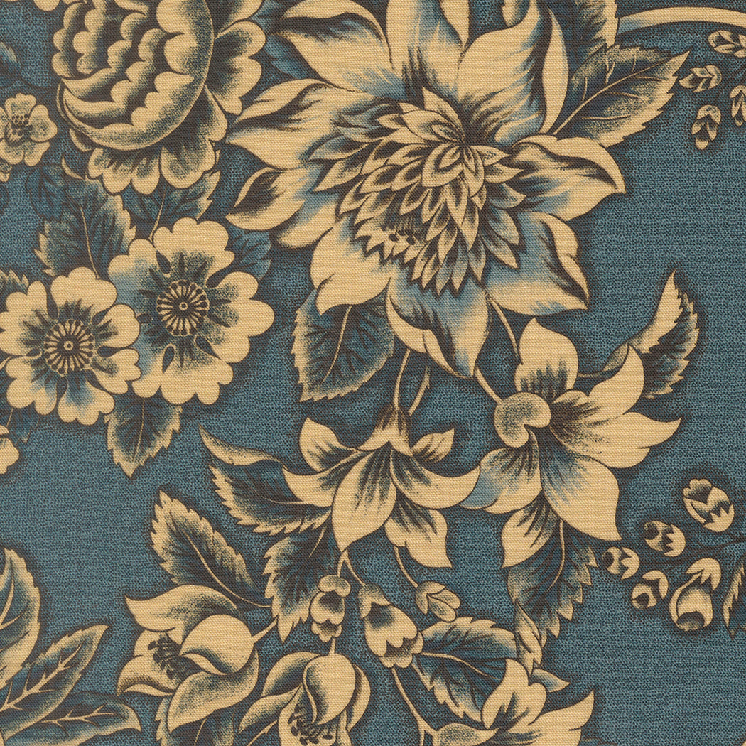 A close-up of a floral patterned fabric or wallpaper featuring large cream-colored flowers and leaves on a muted blue-gray background.