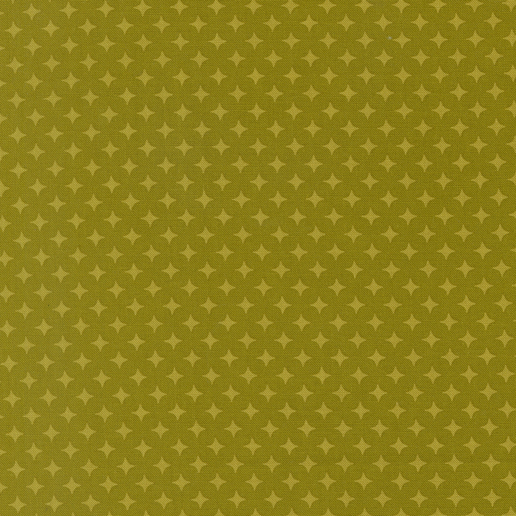 Pattern of small stars on a green background