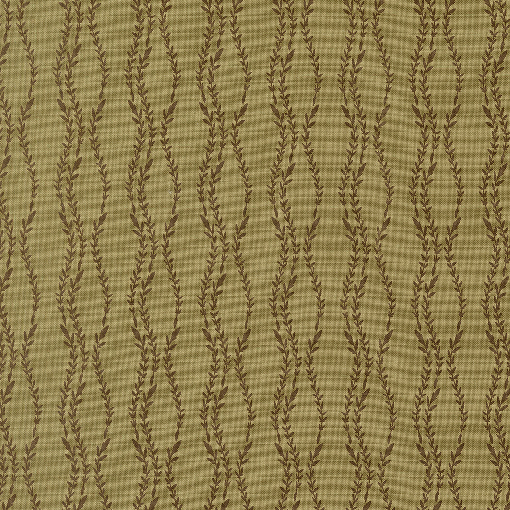 Textured fabric with leaf pattern on a beige background