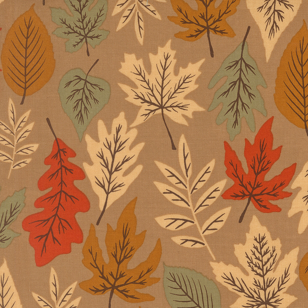 Pattern of autumn leaves on a brown background