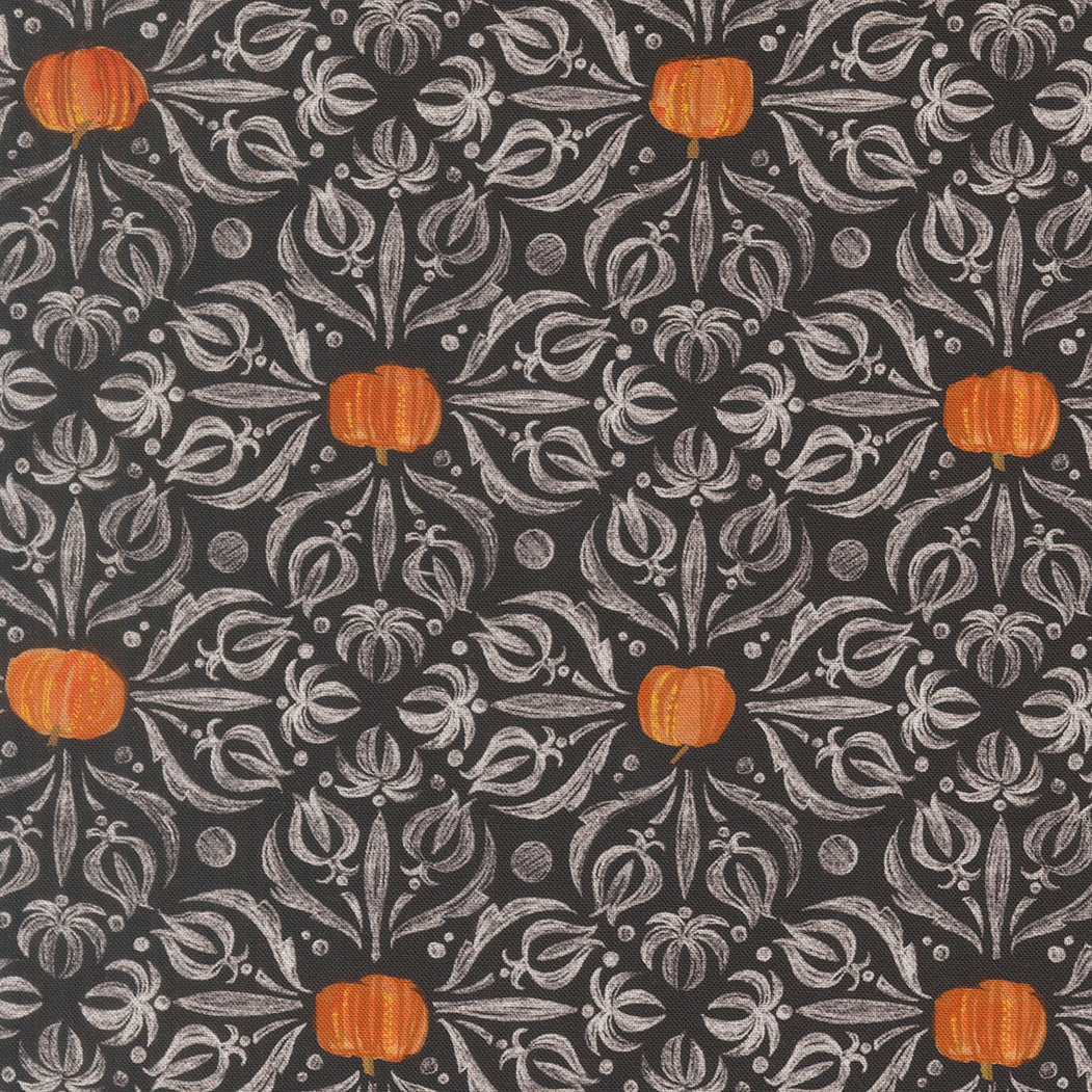 Patterned fabric with orange pumpkins and gray floral design on a black background
