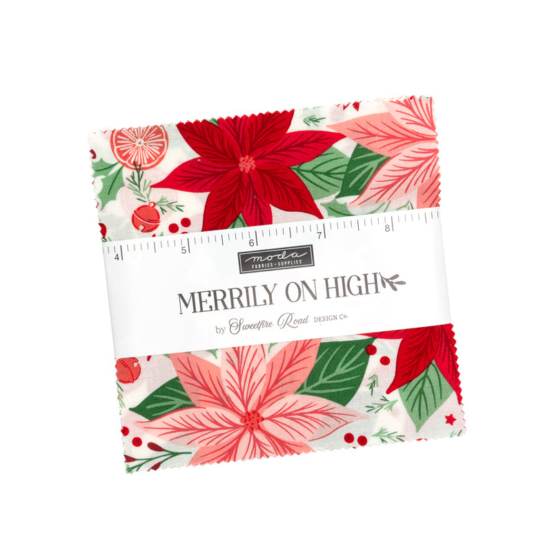 Fabric bundle with poinsettia pattern and 'Moda' branding on a white background