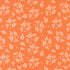 White floral pattern on an orange fabric background