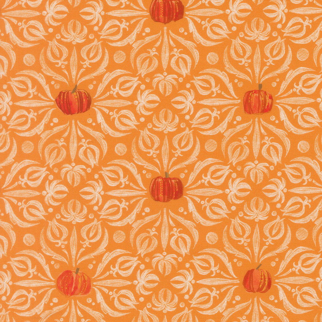Patterned fabric with pumpkins on an orange background