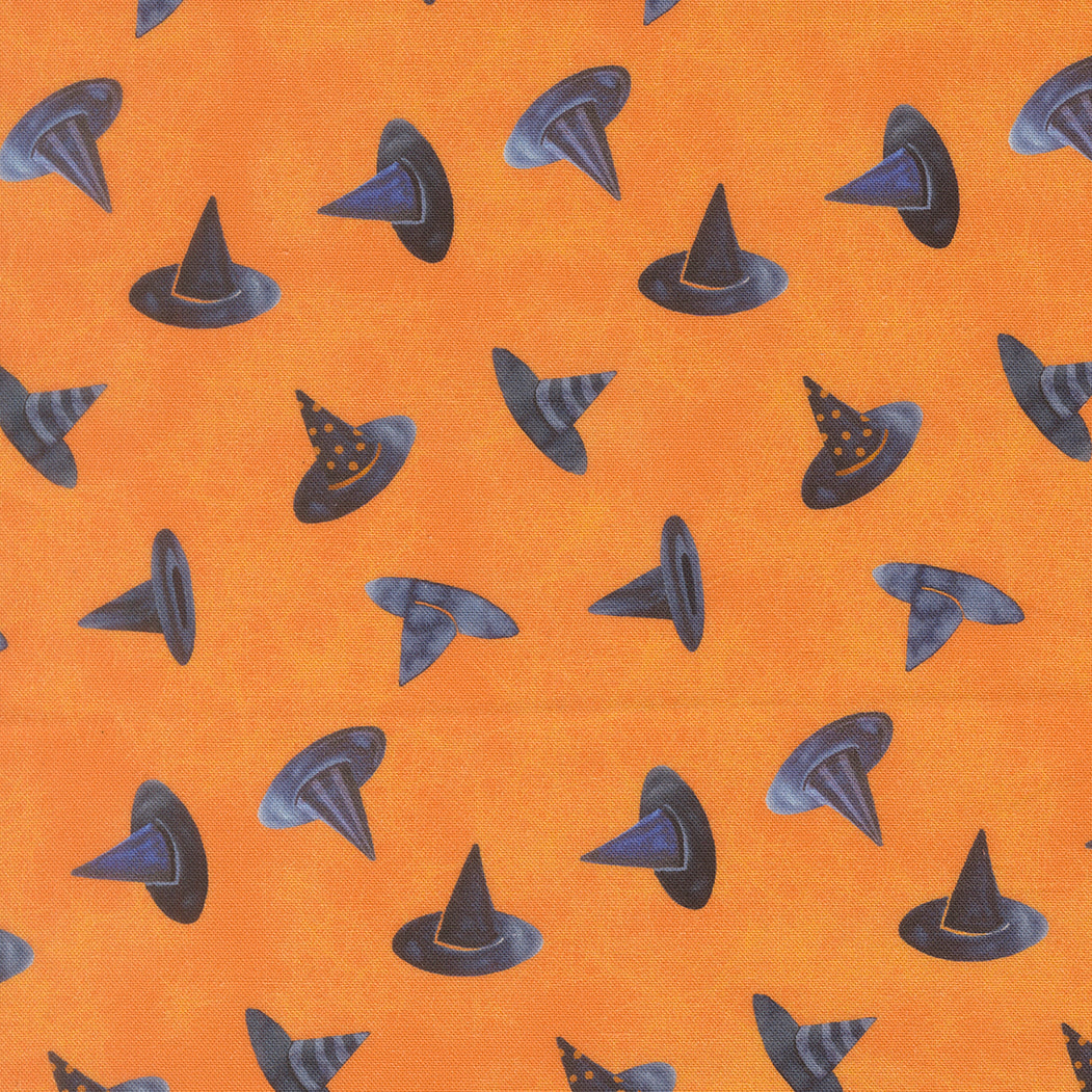 Pattern of black witch hats on an orange background