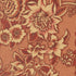 A close-up of a floral patterned material featuring large cream and rust-brown flowers with leaves on a textured tan background.