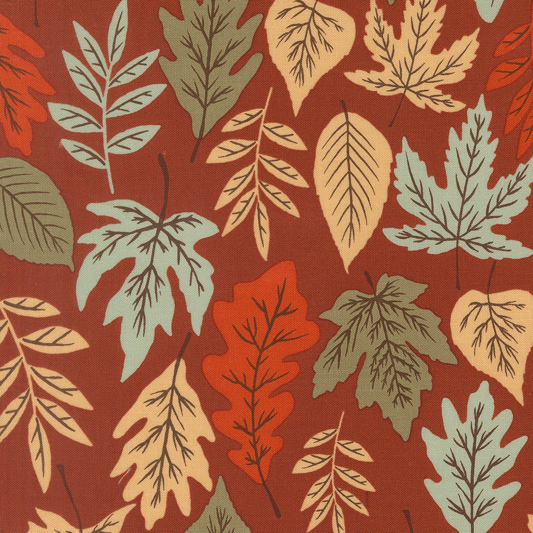 Pattern of autumn leaves on a red background