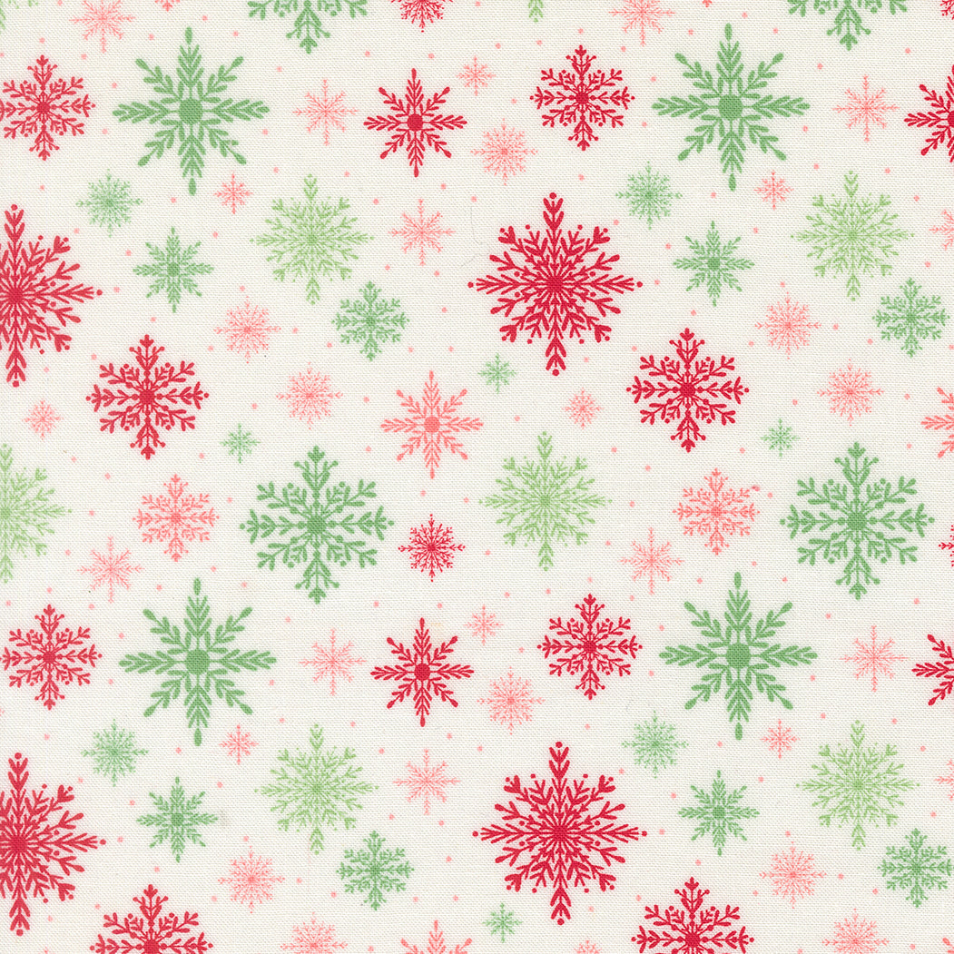 Pattern of red, green, and pink snowflakes on a white background