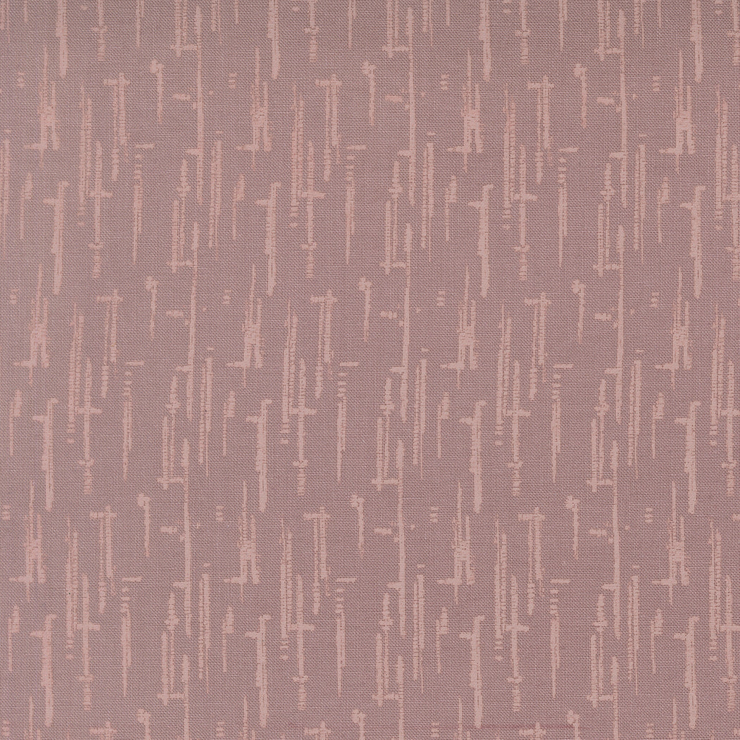Textured patterned fabric with vertical lines on a brown background