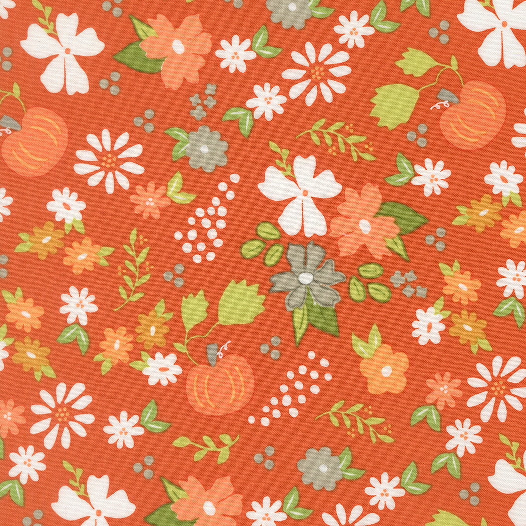 Floral and pumpkin pattern on a red background