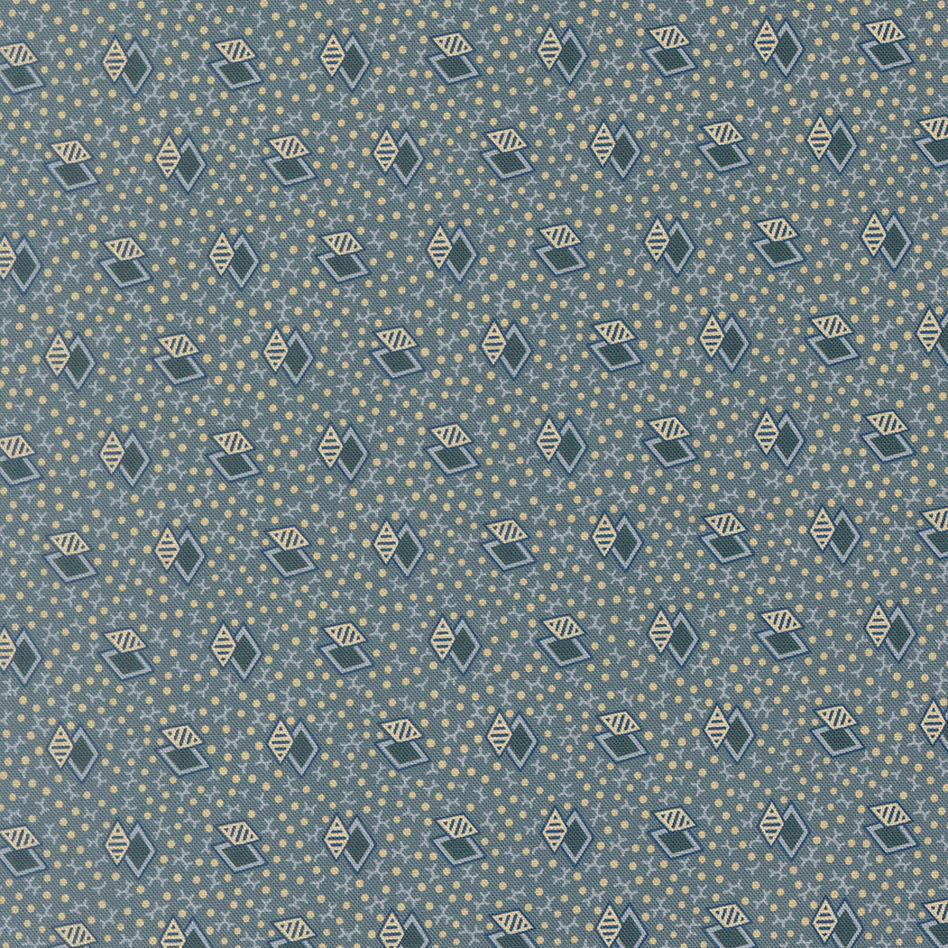 Patterned fabric with geometric shapes on a blue background