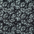Pattern of white floral shapes on a black background