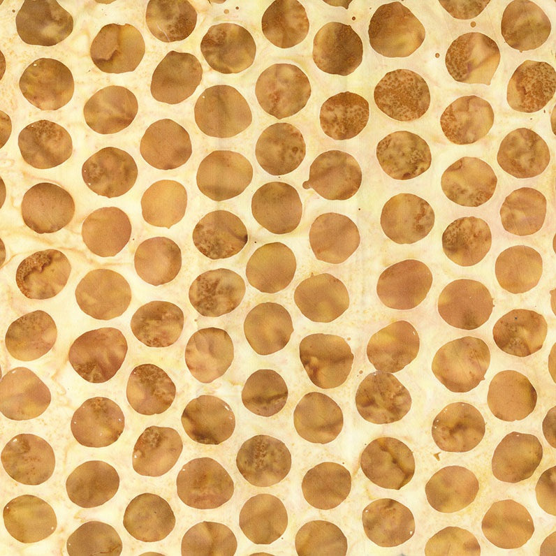 Pattern of brown circular shapes on a beige background