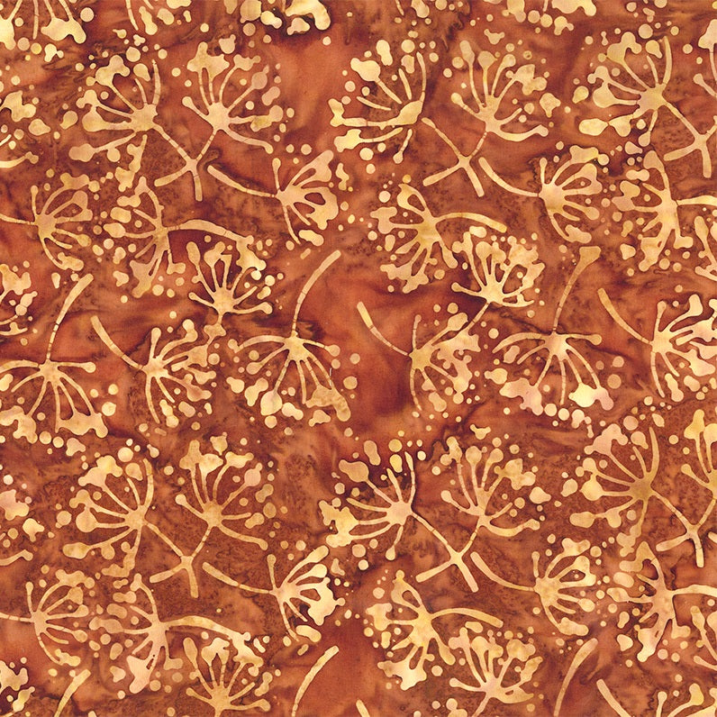 Orange fabric with gold floral pattern