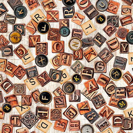 A dense arrangement of vintage-style decorative letter tiles in warm brown, beige, black, and muted gold tones on a light textured background.