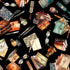 Collage of vintage items including books, glasses, and writing instruments on a black background