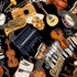 A repeating pattern of illustrated musical instruments on a black background, including violins, guitars, a piano, drums, brass instruments, sheet music, and musical notes.