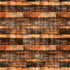A close-up of rustic horizontal wooden planks with weathered brown, black, and orange tones and visible grain texture.
