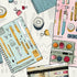 A flat-lay illustration of various stationery items, including notebooks, pens, binder clips, washi tape, and a pencil case, arranged on a light gray background with subtle gray chevron patterns.