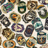 Pattern of various vintage-style labels with different designs and text on a light background.