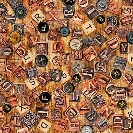 A dense arrangement of vintage-style decorative letter blocks and alphabet tiles in many colors, including black, bronze, copper, beige, and gray, scattered across a textured brown background.