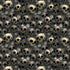 Pattern of skulls and small flowers on a dark background