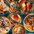 A close-up of a textile pattern featuring multiple overlapping circular illustrations with desert and animal motifs in orange, brown, cream, teal, and red tones.