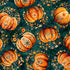 Pattern of ornate pumpkins and flowers on a dark teal background