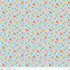Floral pattern fabric with a ruler at the bottom on a light blue background