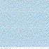 Fabric with white polka dots on a light blue background, featuring a ruler at the bottom.