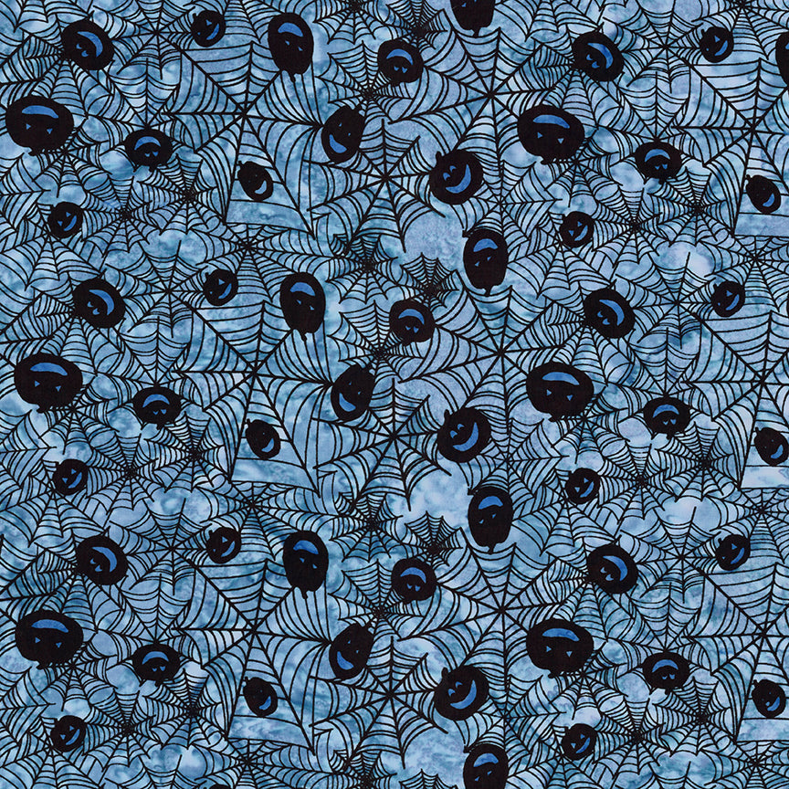Pattern of spider webs and black pumpkins on a blue background
