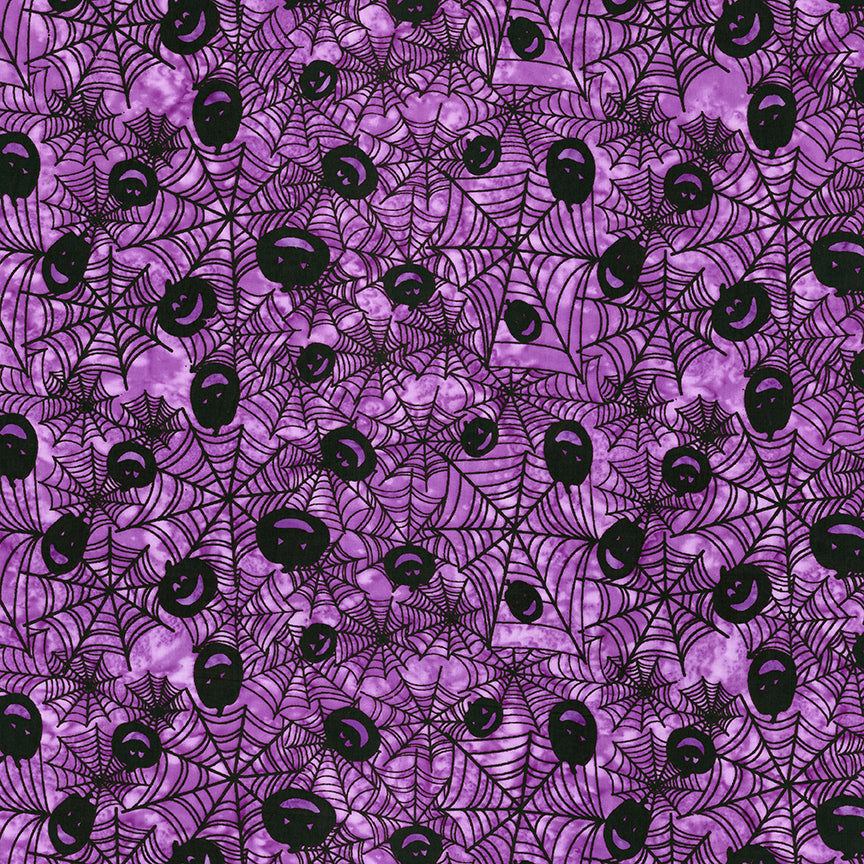 Purple fabric with black spider webs and black pumpkins pattern