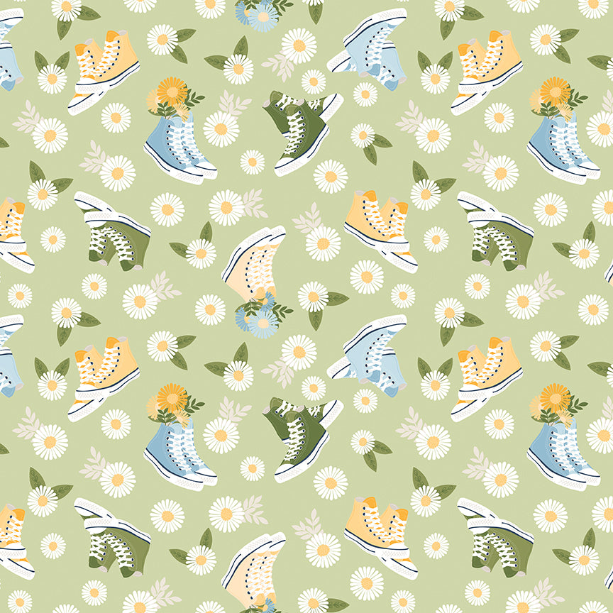 Pattern of sneakers and flowers on a green background