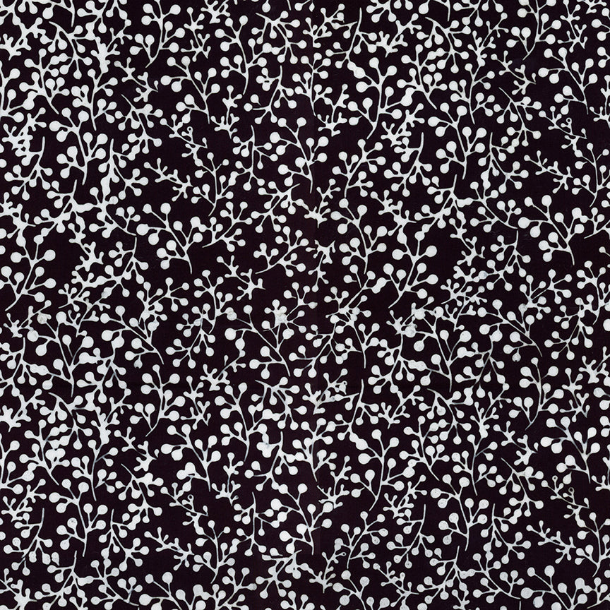 A close-up of a repeating botanical pattern featuring delicate white leafy vines and small oval leaves on a solid black background.