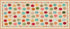 A table runner design featuring rows of colorful patterned pumpkin motifs on a warm beige background, framed by a decorative border of small triangles and geometric shapes.