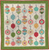 A square quilted textile featuring rows of colorful Christmas ornament motifs arranged in a grid, bordered by a green patterned section and a red outer border. The ornament shapes include hexagons, octagons, and teardrops in teal, green, pink, yellow, red, and blue, with gray hanging hooks above each.