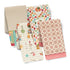 Set of five patterned kitchen towels on a white background