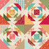 Colorful quilt pattern with geometric shapes and floral designs