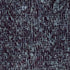 A close-up of a dark navy and black patterned fabric featuring a repeating abstract design of small white teardrop-like shapes and intersecting lines.
